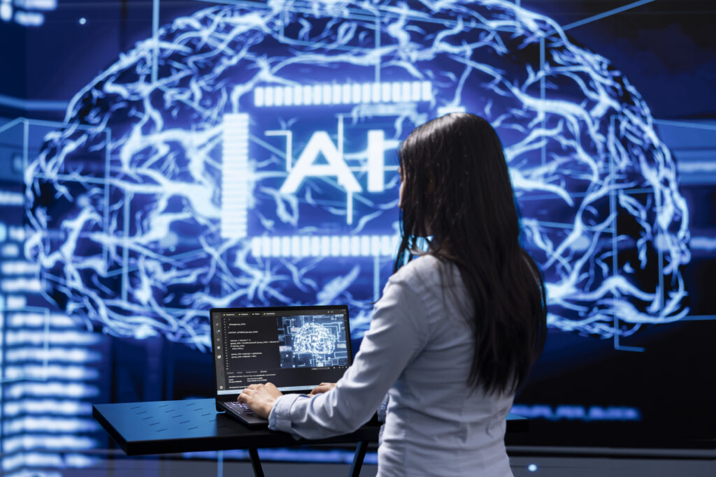 Programmer analyzing complex AI brain models on laptop, running simulations